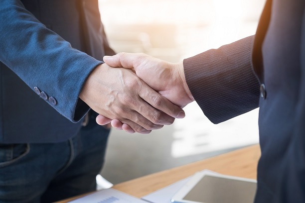 two confident business man shaking hands during meeting office success dealing greeting partner concept